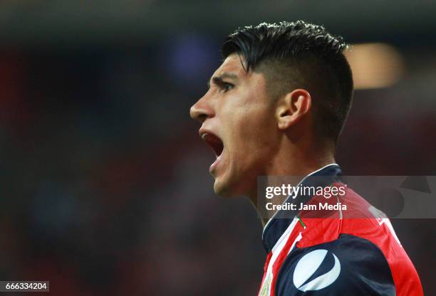 Alan Pulido of Chivas celebrates after scoring his team's first goal during the 13th round match between Chivas and Puebla as part of the Torneo...