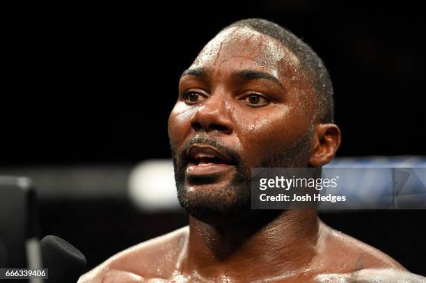 Anthony Johnson announces his retirement after his defeat to Daniel Cormier in their UFC light heavyweight championship bout during the UFC 210 event...
