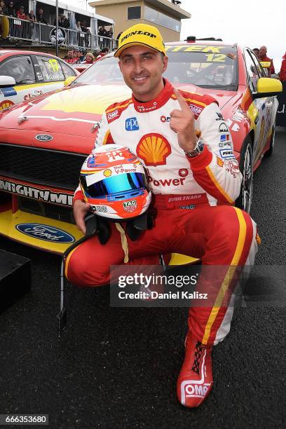 Fabian Coulthard driver of the Shell V-Power Racing Team Ford Falcon FGX celebrates after winning race 4 for the Tasmania SuperSprint, which is part...