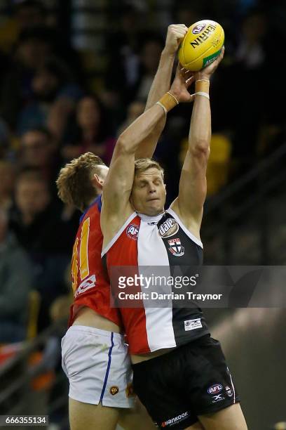 Nick Riewoldt of the Saints marks the ball during the round three AFL match between the St Kilda Saints and the Brisbane Lions at Etihad Stadium on...