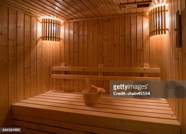 sauna room with traditional sauna accessories for healthy. - sauna stock pictures, royalty-free photos & images