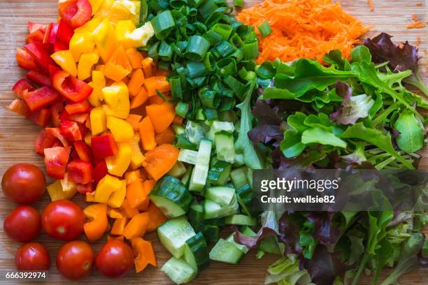 english salad on a board - colorful vegetables summer stock pictures, royalty-free photos & images