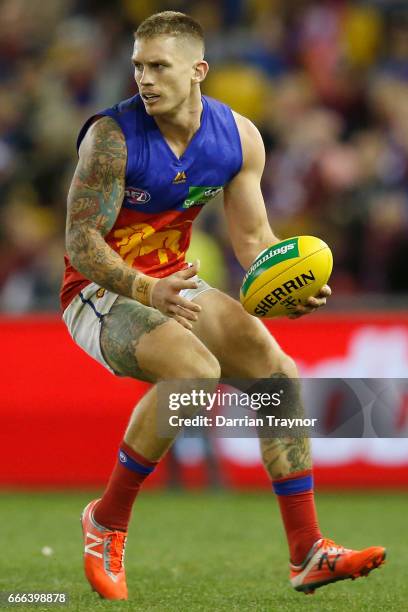 Dayne Beams of the Lions runs with the ball during the round three AFL match between the St Kilda Saints and the Brisbane Lions at Etihad Stadium on...