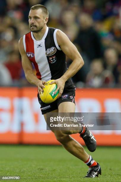 Jarryn Geary of the Saints runs with the ball during the round three AFL match between the St Kilda Saints and the Brisbane Lions at Etihad Stadium...