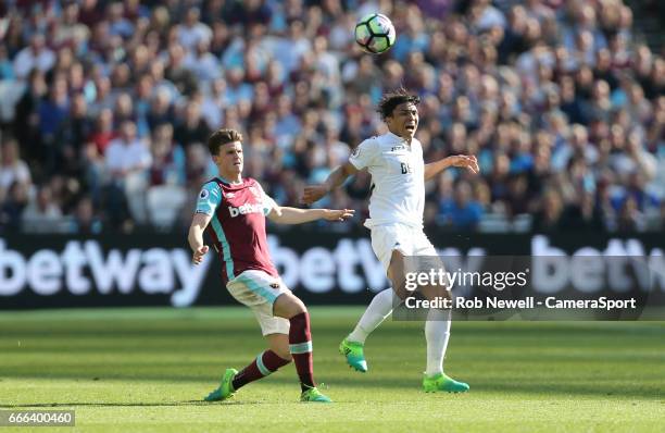 West Ham United's Sam Byram and Swansea City's Jefferson Montero during the Premier League match between West Ham United and Swansea City at London...