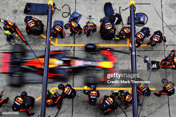Daniel Ricciardo of Australia driving the Red Bull Racing Red Bull-TAG Heuer RB13 TAG Heuer makes a pit stop for new tyres during the Formula One...