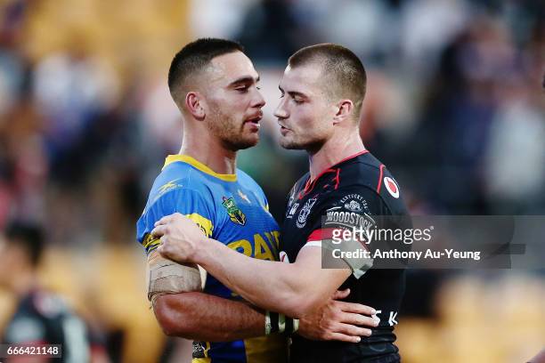 Kieran Foran of the Warriors is congratulated by Corey Norman of the Eels after the round six NRL match between the New Zealand Warriors and the...