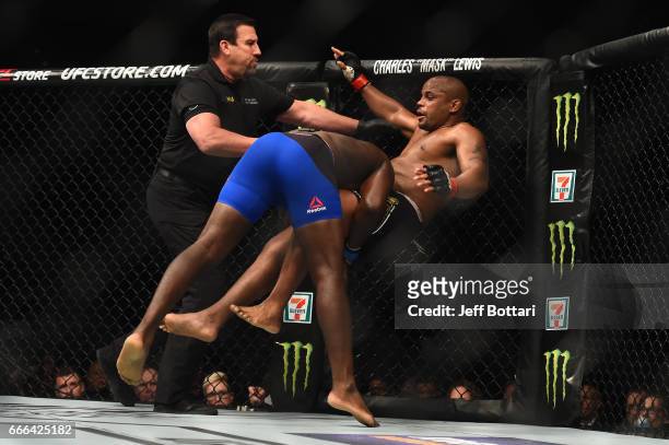 Anthony Johnson takes down Daniel Cormier in their UFC light heavyweight championship bout during the UFC 210 event at the KeyBank Center on April 8,...