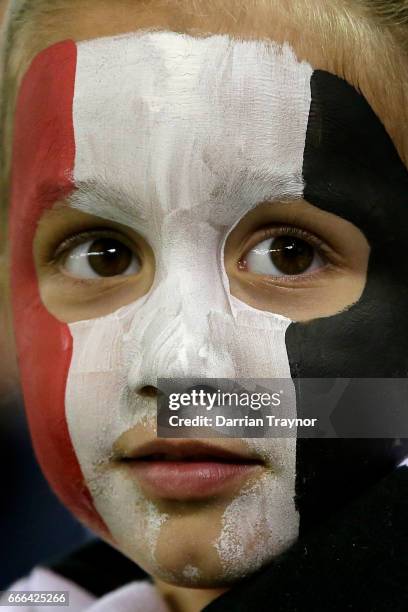Young St Kilda fan looks on during the round three AFL match between the St Kilda Saints and the Brisbane Lions at Etihad Stadium on April 9, 2017 in...