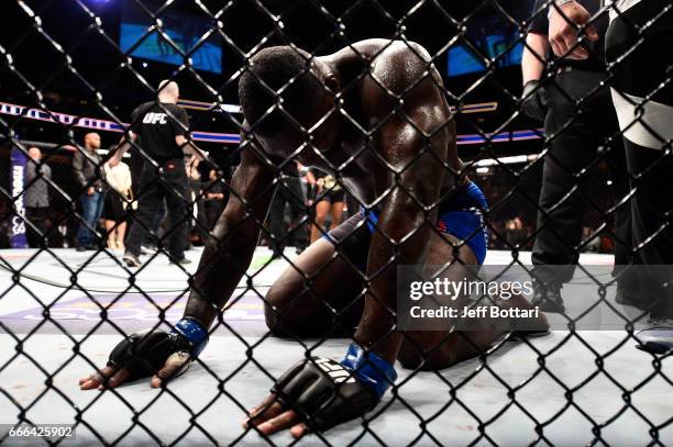 Anthony Johnson reacts in his final moments in the Octagon after announcing his retirement from MMA following his submission loss to Daniel Cormier...