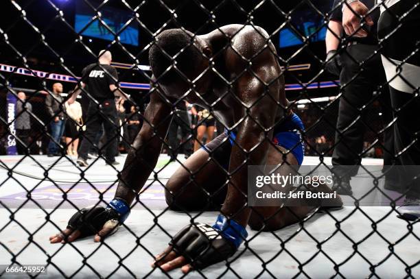 Anthony Johnson reacts in his final moments in the Octagon after announcing his retirement from MMA following his submission loss to Daniel Cormier...