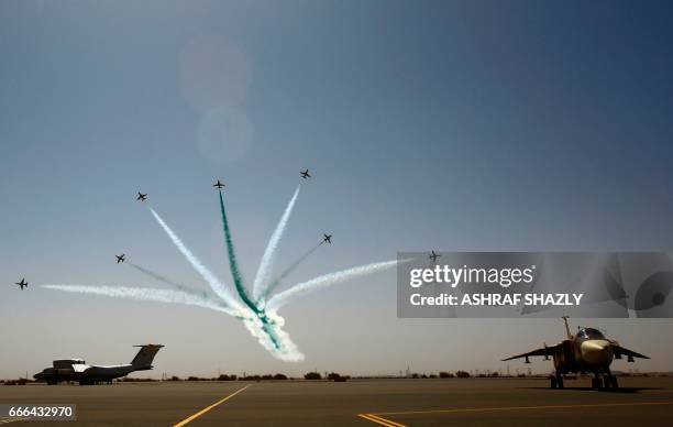 Planes take part in a flyover during a joint Sudan and Saudi Arabia air force drill at the Marwa air base, near Meroe some 350 kilometres north of...