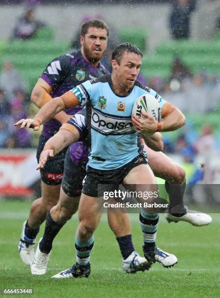 James Maloney of the Sharks runs with the ball during the round six NRL match between the Melbourne Storm and the Cronulla Sharks at AAMI Park on...