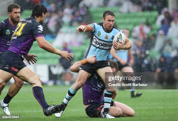 James Maloney of the Sharks runs with the ball during the round six NRL match between the Melbourne Storm and the Cronulla Sharks at AAMI Park on...