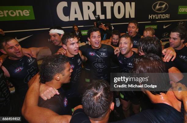 Jack Silvagni of the Blues celebrates his first ever win with Sam Petrevski-Seton, Tom Williamson and Rhys Palmer during the round three AFL match...