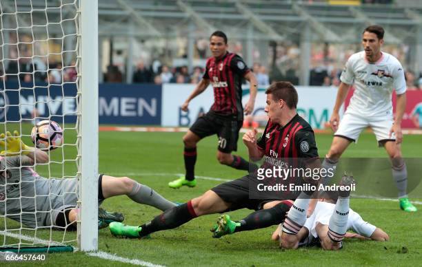 Mario Pasalic of AC Milan scores his goal during the Serie A match between AC Milan and US Citta di Palermo at Stadio Giuseppe Meazza on April 9,...