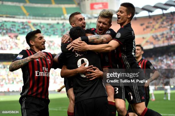 Suso of Milan celebrates after scoring the opening goal during the Serie A match between AC Milan and US Citta di Palermo at Stadio Giuseppe Meazza...