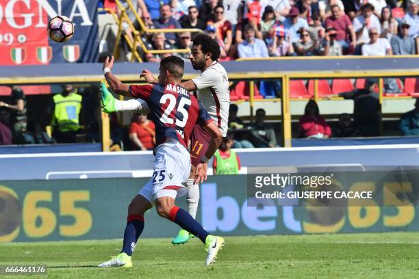 Roma's midfielder from Egypt Mohamed Salah kicks and scores during the Italian Serie A football match Bologna vs AS Roma at "Dall'Ara Stadium" in...