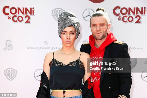 Alina Sueggeler and Andi Weizel of the German band Frida Gold attend the 'Conni & Co 2 - Das Geheimnis des T-Rex' premiere on April 9, 2017 in...