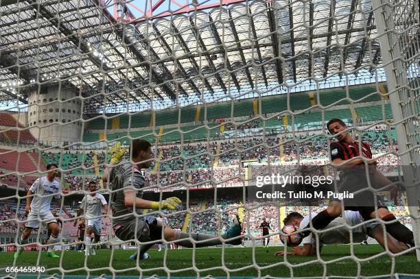 Mario Pasalic of Milan scores his team's second goal during the Serie A match between AC Milan and US Citta di Palermo at Stadio Giuseppe Meazza on...