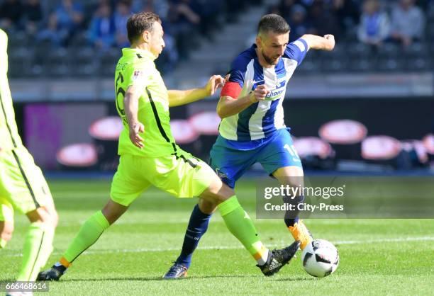 Christoph Janker of FC Augsburg and Vedad Ibisevic of Hertha BSC during the game between Hertha BSC and FC Augsburg on april 9, 2017 in Berlin,...