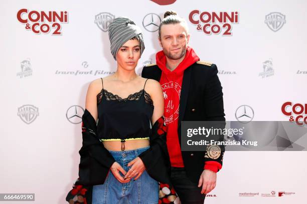 Alina Sueggeler and Andi Weizel of the German band Frida Gold attend the 'Conni & Co 2 - Das Geheimnis des T-Rex' premiere on April 9, 2017 in...