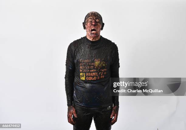 Competitors in the the annual McVities Mud Madness 8km cross country run pose for a portrait in a pop up photo booth on April 9, 2017 in Portadown,...