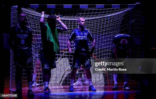 Anders Eggert of Flensburg looks dejected after the Rewe Final Four final match between SG Flensburg-Handewitt and Thw Kiel at Barclaycard Arena on...