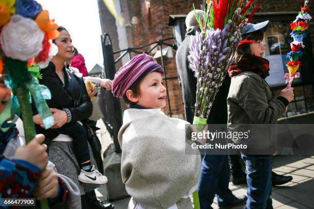 People attend traditional Palm Sunday celebration in Krakow, Poland on 9 April, 2017. During Palm Sunday, which is also called The Sunday of the...