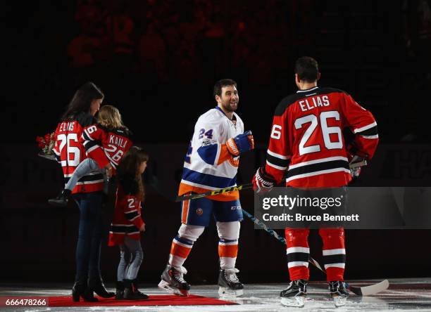 Patrik Elias of the New Jersey Devils who recently announced his retirement, takes part in a pregame ceremony prior to the game against Stephen...