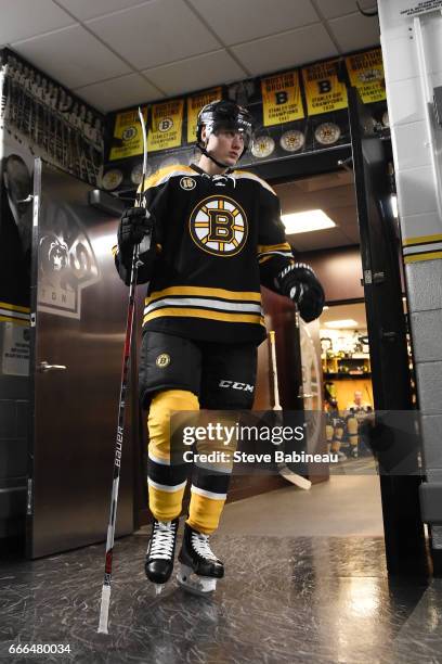 Jakob Forsbacka Karlsson of the Boston Bruins walks to the ice for warm ups in his first NHL game against the Washington Capitals at the TD Garden on...