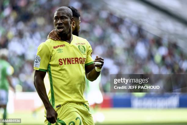 Nante's Burkinabese forward Prejuce Nakoulma celebrates and reacts after scoring a goal during the French L1 football match between AS Saint-Etienne...