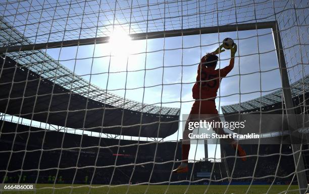 Marwin Hitz of Augsburg makes a save during the Bundesliga match between Hertha BSC and FC Augsburg at Olympiastadion on April 9, 2017 in Berlin,...