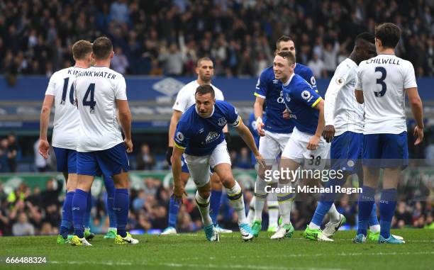 Phil Jagielka of Everton celebrates scoring his team's third goal during the Premier League match between Everton and Leicester City at Goodison Park...