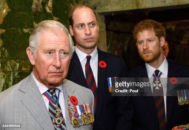 Prince Charles, Prince of Wales, Prince William, Duke of Cambridge and Prince Harry visit the tunnel and trenches at Vimy Memorial Park during the...