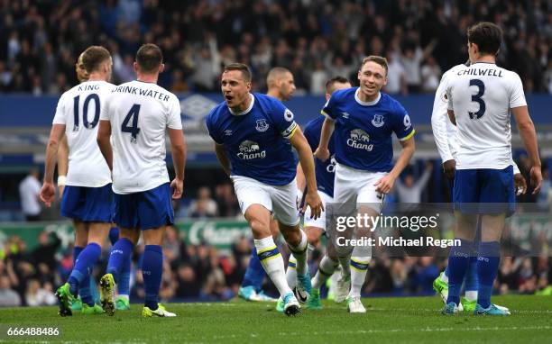 Phil Jagielka of Everton celebrates scoring his team's third goal during the Premier League match between Everton and Leicester City at Goodison Park...