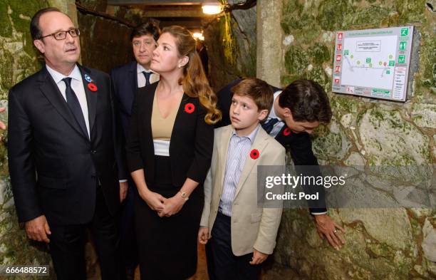 French President Francois Hollande joins Canadian Prime Minister Justin Trudeau and his wife Sophie Gregoire Trudeau and son Xavier as they visit the...