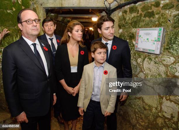 French President Francois Hollande joins Canadian Prime Minister Justin Trudeau and his wife Sophie Gregoire Trudeau and son Xavier as they visit the...