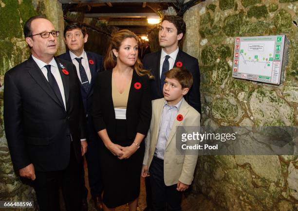 French President Francois Hollande joins Canadian Prime Minister Justin Trudeau and his wife Sophie Gregoire Trudeau and son Xavier as they visit the...
