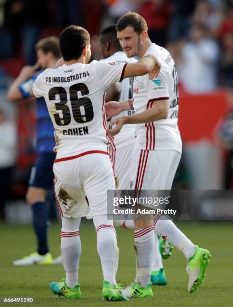 Pascal Gross of Ingolstadt celebrates his team's first goal with team mate Almog Cohen during the Bundesliga match between FC Ingolstadt 04 and SV...
