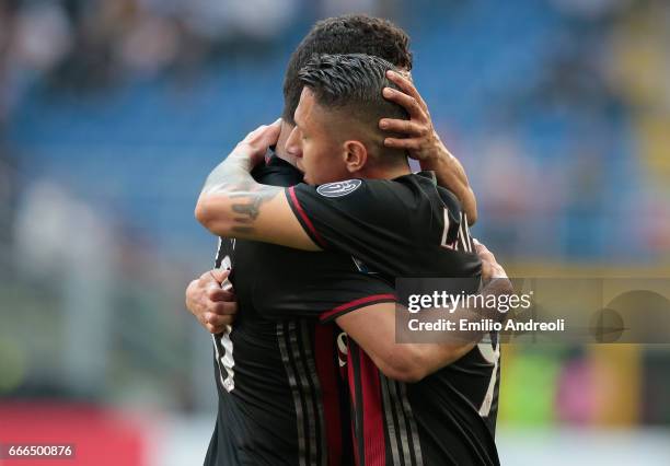 Carlos Bacca of AC Milan embraces Gianluca Lapadula of AC Milan during the Serie A match between AC Milan and US Citta di Palermo at Stadio Giuseppe...