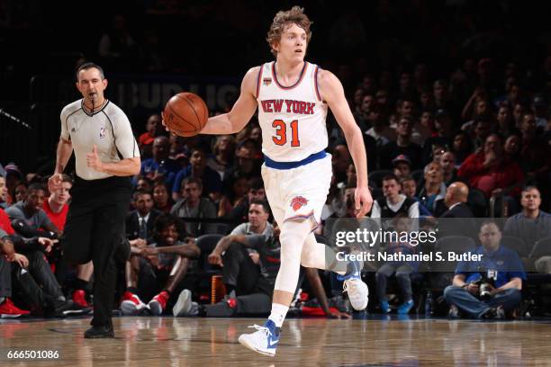 Ron Baker of the New York Knicks handles the ball during a game against the Toronto Raptors on April 9, 2017 at Madison Square Garden in New York...