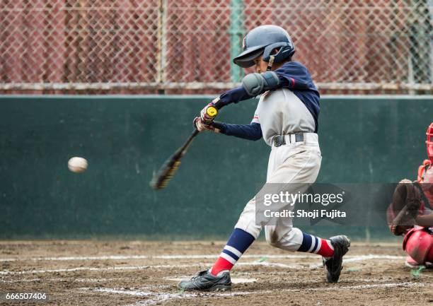 youth baseball players,playing game,batting - battere la palla foto e immagini stock