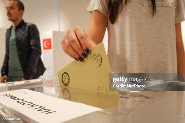 People are seen voting for the constitutional referendum at the Turkish embassy in Warsaw, Poland on 9 April, 2017.