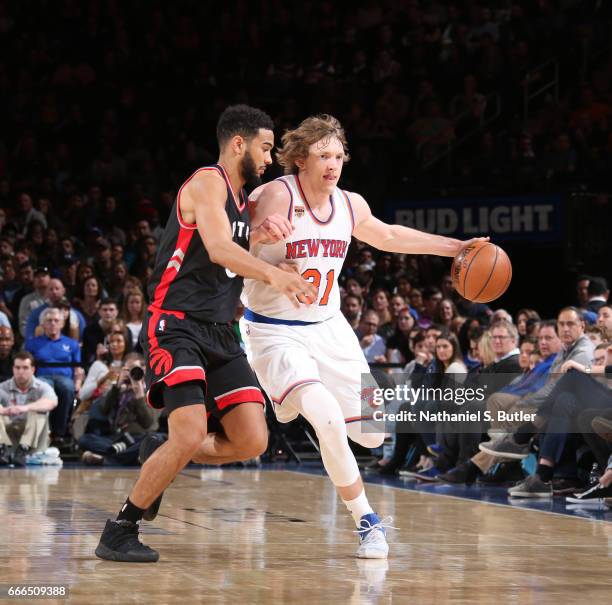 Ron Baker of the New York Knicks handles the ball during a game against the Toronto Raptors on April 9, 2017 at Madison Square Garden in New York...