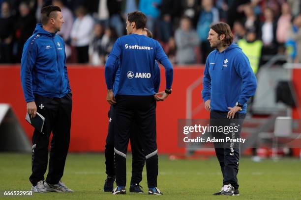 Head coach Torsten Frings of Darmstadt and assistant coaches react after the Bundesliga match between FC Ingolstadt 04 and SV Darmstadt 98 at Audi...