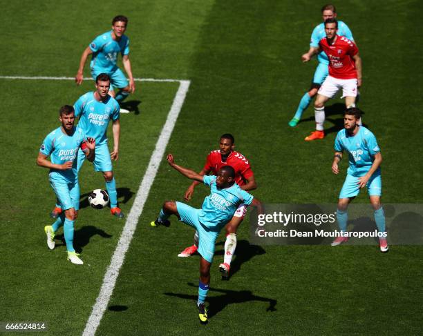 Kamohelo Mokotjo Of FC Twente clears the ball away from Sebastien Haller of FC Utrecht during the Dutch Eredivisie match between FC Utrecht and FC...