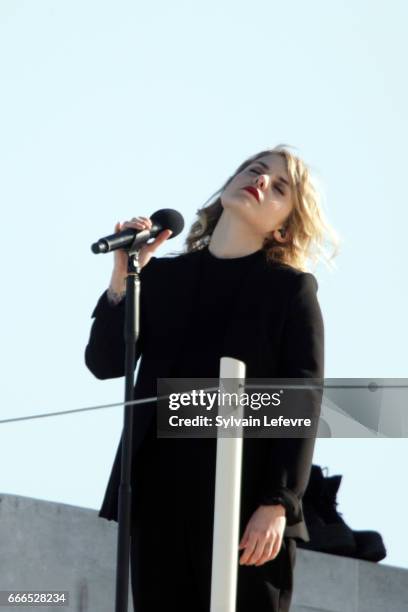 Canadian singer Coeur de Pirate performs on stage during the official ceremony for the Commemoration of the 100th Anniversary of Vimy Battle on April...