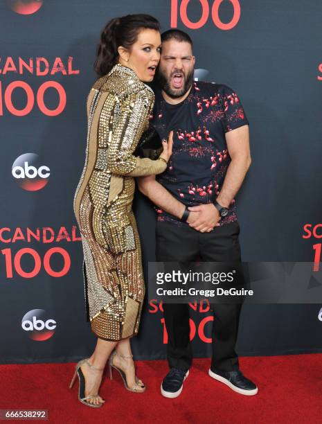 Actors Bellamy Young and Guillermo Diaz arrive at ABC's "Scandal" 100th Episode Celebration at Fig & Olive on April 8, 2017 in West Hollywood,...