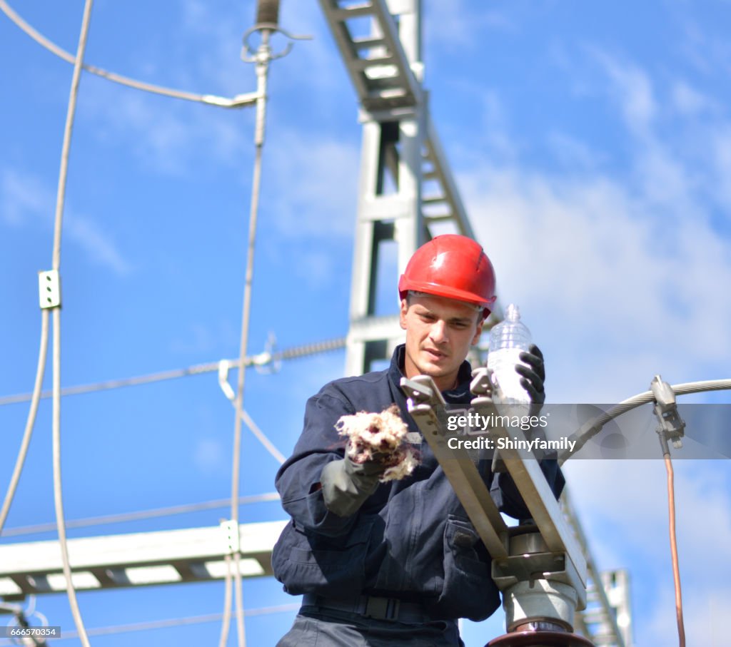 Electrician High Rises Electrician Working At The Height Of The Electricity Substation High ...